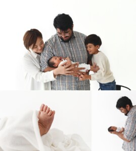 Family of four holding newborn during studio newborn photography session in St. Louis